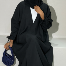 Load image into Gallery viewer, Ramadan Three-Piece Italian Linen Blend Set: Bow-Tied Sleeve Abaya, Inner Dress & Hijab (Black)