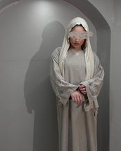 Load image into Gallery viewer, Close-up of handmade design on sleeve of beige linen abaya for elegant detailing