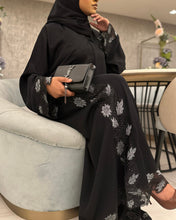 Load image into Gallery viewer, Side view showing elegant silver lace abaya with flowing silhouette