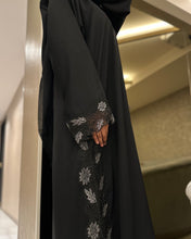 Load image into Gallery viewer, Close-up of silver lace trim and soft fabric texture on elegant abaya