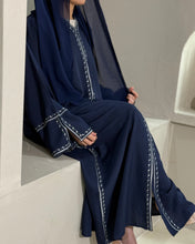 Load image into Gallery viewer, Close-up of embroidered split sleeves on navy linen abaya for modest fashion