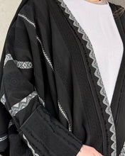 Load image into Gallery viewer, Side view of Sadu embroidered black abaya made from cotton