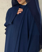 Load image into Gallery viewer, Side profile of navy abaya set showing patterned fabric and flow