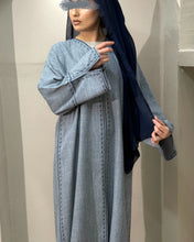 Load image into Gallery viewer, Back view of modest denim abaya with elegant sleeve and fabric design
