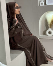 Load image into Gallery viewer, Close-up of handmade embroidery on sleeve of chocolate linen blend abaya
