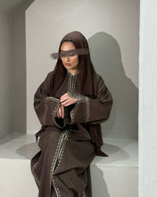 Load image into Gallery viewer, Side view of chocolate linen abaya showing elegant sleeve cut and embroidery
