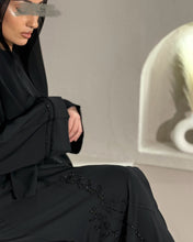 Load image into Gallery viewer, Elegant frayed embellished abaya with shimmering finish for Eid occasions
