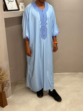 Load image into Gallery viewer, Close-up of breathable fabric used in sky blue premium Moroccan thobe
