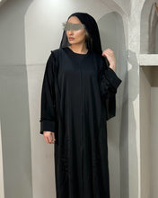 Load image into Gallery viewer, Flowing frayed embellished abaya designed for stylish and modest Eid wear
