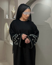 Load image into Gallery viewer, Full-length black linen blend abaya with elegant handmade sleeve work
