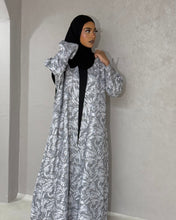 Load image into Gallery viewer, Fabric texture close-up of jacquard patterned abaya material
