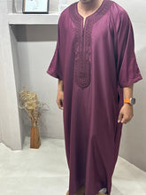 Load image into Gallery viewer, Male model wearing burgundy premium Moroccan thobe with embroidery

