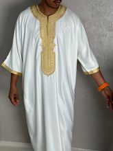 Load image into Gallery viewer, Male model wearing premium Moroccan thobe in white and gold
