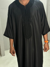 Load image into Gallery viewer, Side profile view of black thobe with clean Moroccan tailoring
