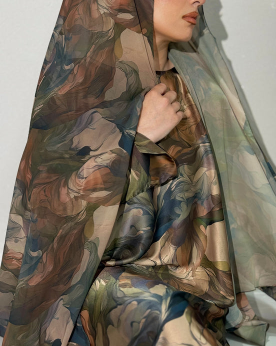 Green soft satin flowery abaya with elegant floral pattern for modest wear

