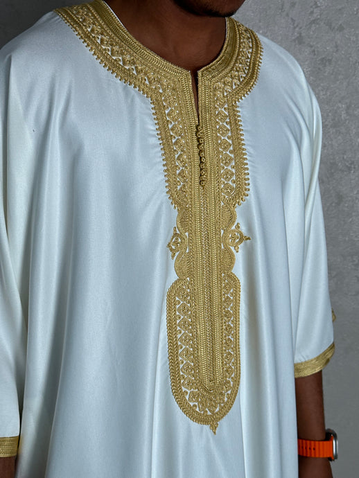 Full front view of premium white Moroccan thobe with gold detailing


