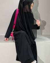 Load image into Gallery viewer, Flared cloche cut design of Black A-Line Abaya showcasing twirl effect
