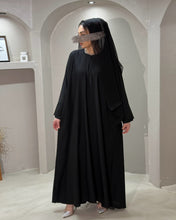 Load image into Gallery viewer, Front view of Black A-Line Abaya with tulip sleeves and cloche cut
