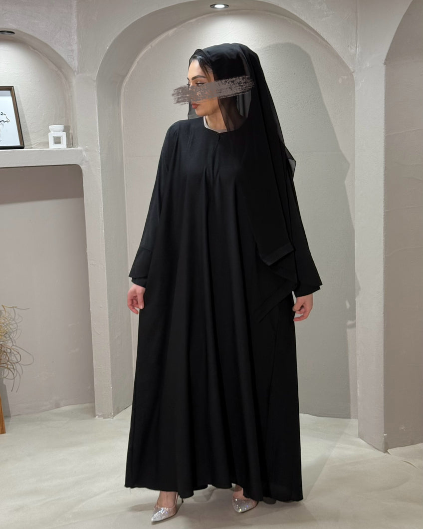 Front view of Black A-Line Abaya with tulip sleeves and cloche cut