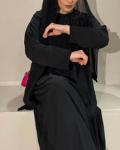 Load image into Gallery viewer, Close-up of elegant tulip sleeves on Black A-Line Abaya
