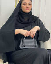 Load image into Gallery viewer, Model wearing Black Pleated Abaya in modest umbrella cut

