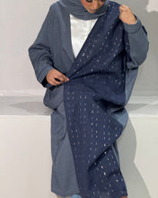 Load image into Gallery viewer, Side view of half embroidered open abaya made from natural linen
