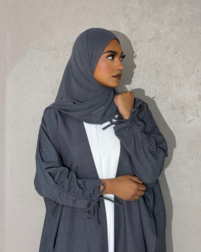 Front view of Blue Stone Linen Abaya Set with bow-tied sleeves