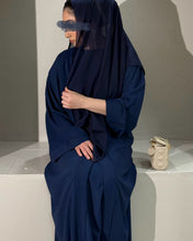 Load image into Gallery viewer, Model wearing navy abaya set styled for elegant occasion
