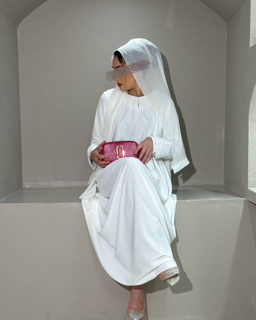 Front view of White A-Line Abaya with tulip sleeves and cloche cut