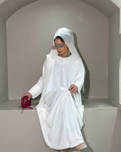 Load image into Gallery viewer, Twirling side view of cloche cut White A-Line Abaya
